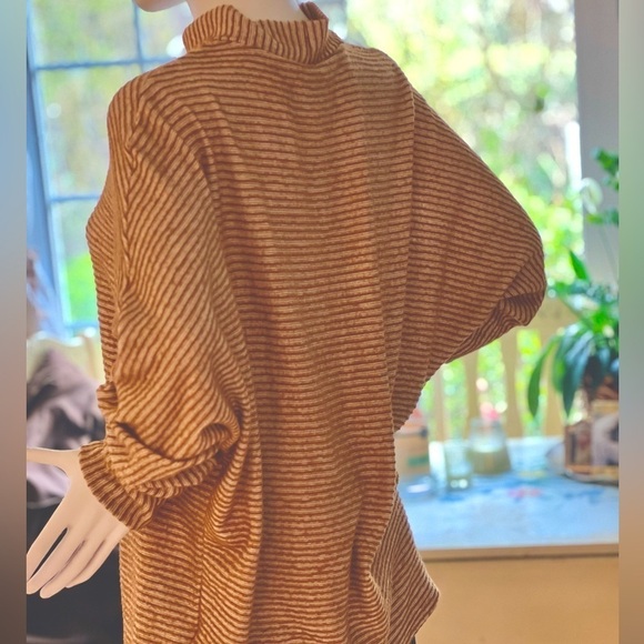 Out from  Under sweater . - Picture 1 of 6